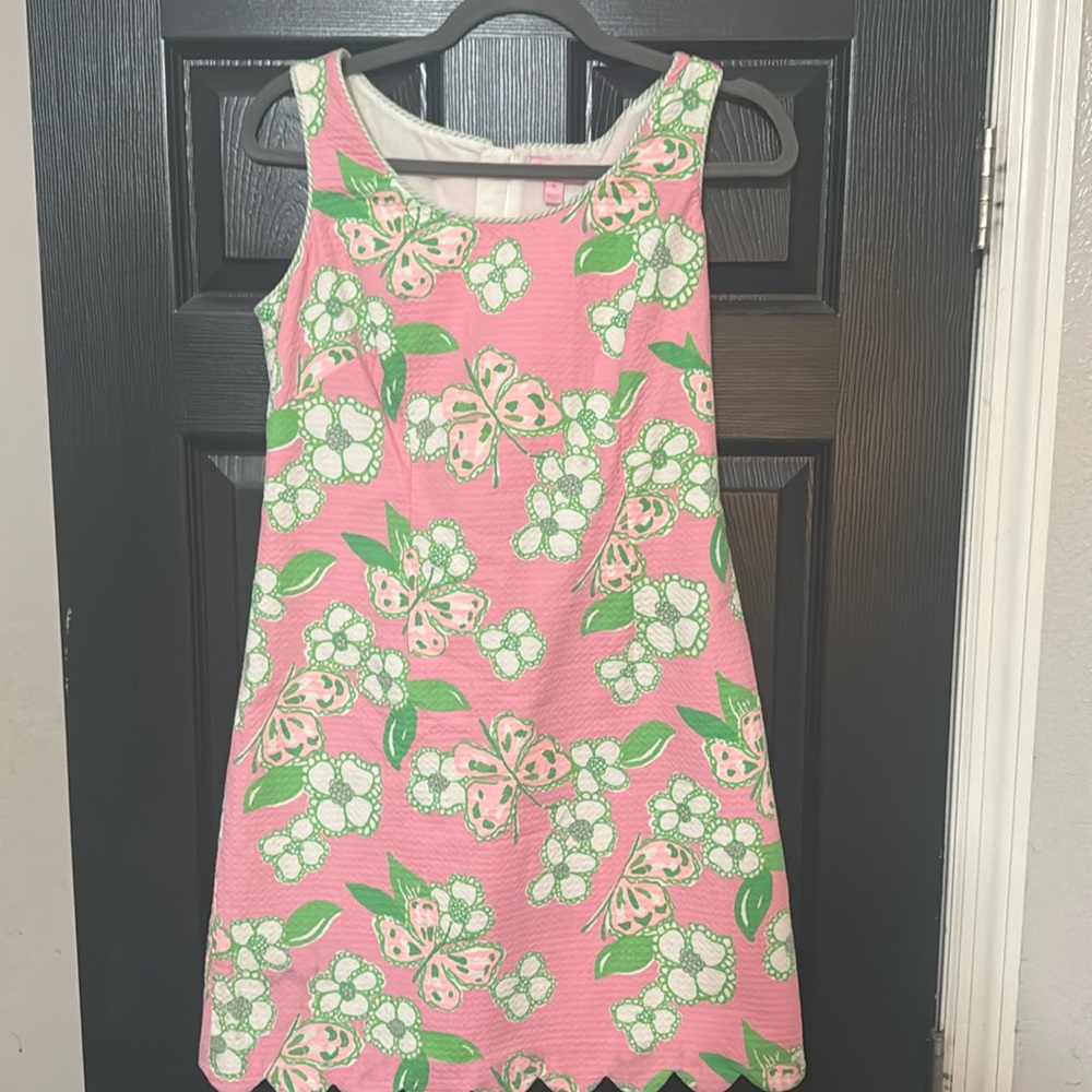 Pink and green flowered sundress with scalloped hem detail